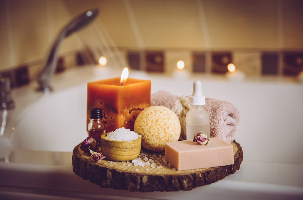 Home spa products on wooden tray