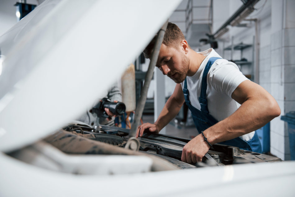 auto technician working on a vehicle