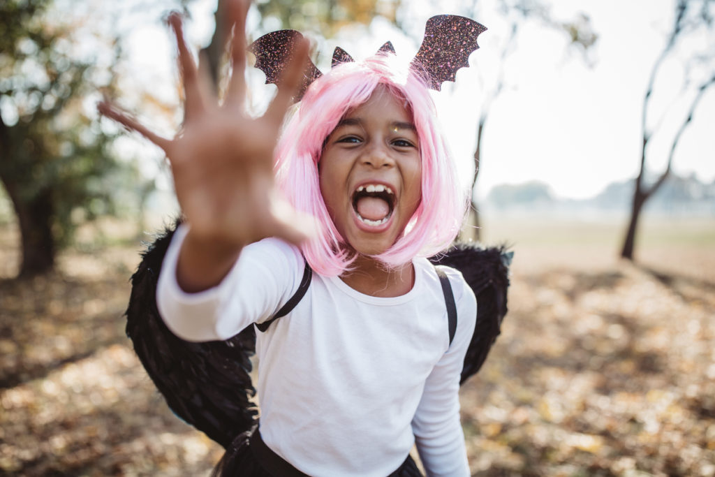 Young girl go for trick or treat